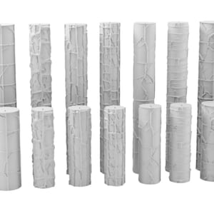 May include: A collection of white, cylindrical decorative pillars with various textured designs. Some pillars have a bark-like texture, while others feature geometric patterns. The pillars vary in height and are arranged in a group.