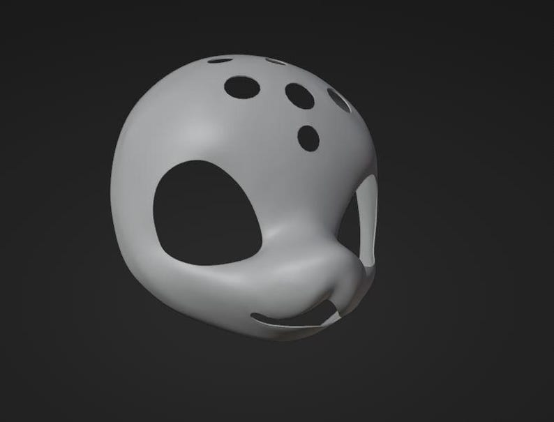 May include: A white, 3D printed mask with a rounded shape and several holes. The mask has a large, round eye hole on each side and a smaller hole in the center of the forehead.