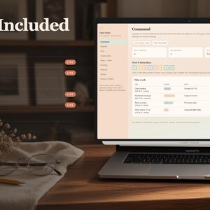 May include: A laptop screen displaying a digital project management dashboard with a list of nine screens titled What's Included, Start Here, Command, Pipeline, Jobs, Inquiry Desk, Rates + Math, Booking, Delivery, and Money on a wooden desk.