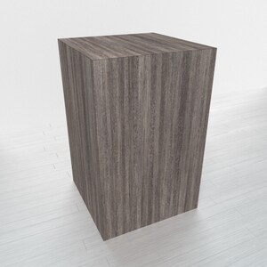 May include: A square wooden display stand with a dark brown woodgrain finish.