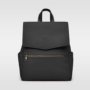 faux leather changing backpack