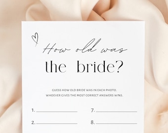 May include: A printable bridal shower game with the text "How old was the bride?" and instructions to guess the bride's age in each photo. The game includes eight numbered lines for players to write their answers.