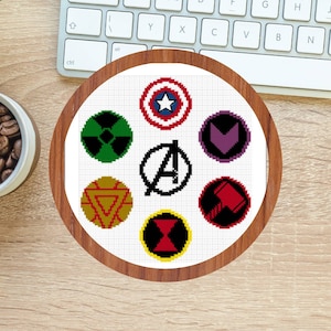 May include: A round white canvas with embroidered images of the Avengers characters. The characters include Captain America, Iron Man, Thor, Hulk, Black Widow, Hawkeye, and the Avengers logo.