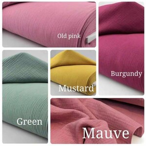 May include: A collage of fabric samples in various colors. The colors include old pink, green, mustard, burgundy, and mauve. Each fabric is rolled up, and the color names are written on the image.