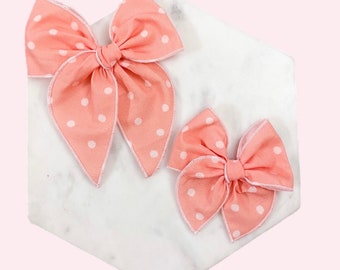 Pink polka dots hair bow, pink bow , baby bow, hair clip, baby headband, fable bow, hemmed bow