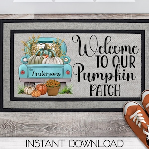 May include: A welcome mat with a blue pickup truck carrying pumpkins and the text "Welcome to our Pumpkin Patch" with the name "the Andersons" on the side of the truck.
