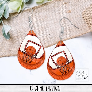 May include: A pair of orange and white teardrop-shaped earrings with a basketball and hoop design. The earrings are made of leather and have silver hooks.