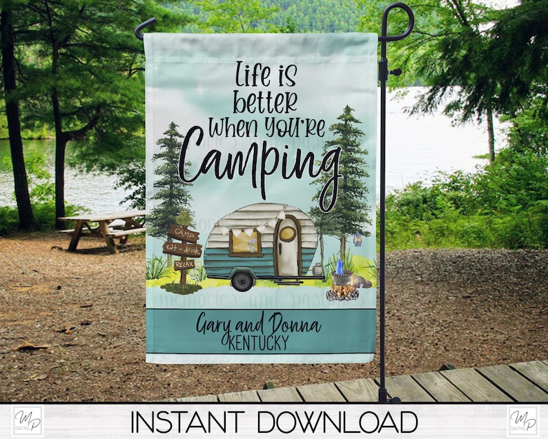 May include: A blue and white camping trailer with a sign that reads "Life is better when you're camping". The trailer is surrounded by trees and a campfire. The text "Gary and Donna Kentucky" is at the bottom of the image.