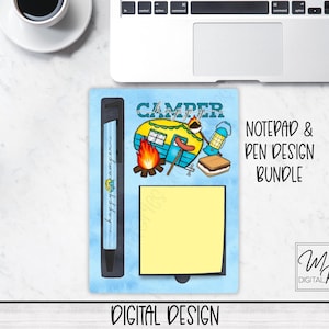 May include: A notepad and pen design bundle with a camping theme. The notepad has a blue background with a yellow sticky note, and a pen with the text "happy camper". The design includes a camper, campfire, and other camping elements. The words "Camper" and "Digital Design" are also visible.