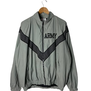 May include: A light green windbreaker jacket with black accents and the word "ARMY" printed on the front.