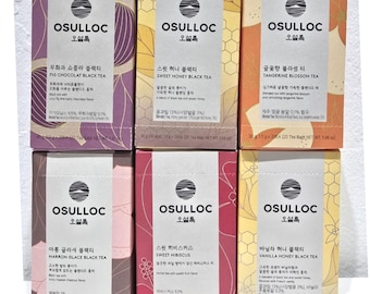 May include: Six boxes of Osulloc tea bags, each with a different flavor. The flavors are: Fig Chocolat Black Tea, Sweet Honey Black Tea, Tangerine Blossom Tea, Marron Glace Black Tea, Sweet Hibiscus, and Vanilla Honey Black Tea. Each box is 30 grams and contains 20 tea bags.
