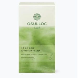 May include: A white box of Osulloc Jeju Matcha Milk Tea. The box has a green and white design with text in English and Korean. The text includes "JEJU MATCHA MILK TEA" and a description of the tea's flavor profile.