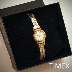 ヴィンテージ TIMEX ゴールドトーン レディース スレンダー 機械式 カクテルウォッチ エクスパンションブレスレットバンド 動作