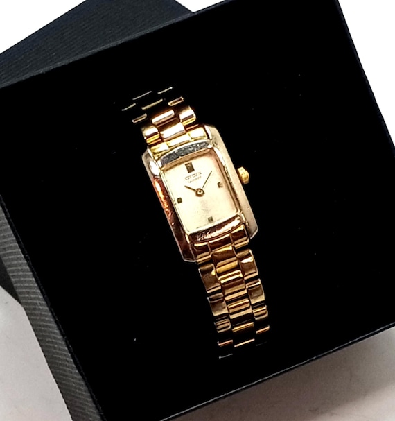 Montre Bracelet Femme LIP Classique à Quartz - Boîtier Rectangulaire Acier, Cadran Blanc, Occasion Avec Défauts