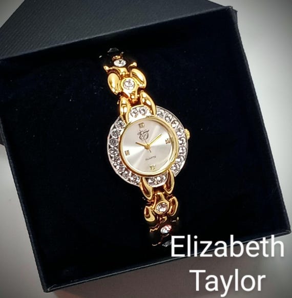 White Diamonds Elizabeth Taylor Watch with Crystal Accents Elizabeth Taylor White Diamonds Womens Gold Tone Charm Watch  main image 4