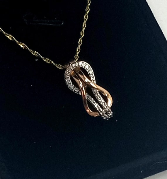 Love Knot Diamond Accent Pendant: 10k Gold Over Sterling Silver