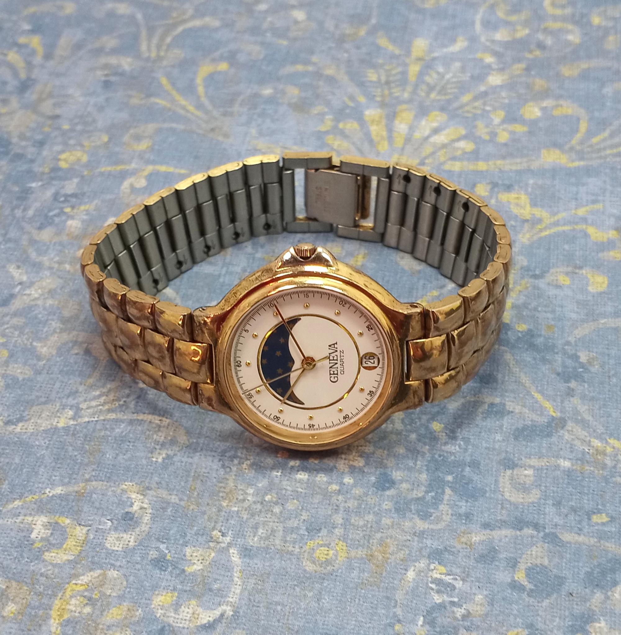 Vintage Geneva Moon Phase Watch: Gold Tone Tank Band, Working