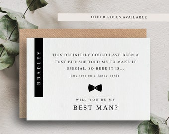 May include: A white card with black text that reads "This definitely could have been a text but she told me to make it special, so here it is... (my text on a fancy card) Will you be my Best Man?"  The card also has a black bow tie graphic and the text "Bradley" and "The Twenty Six Co."