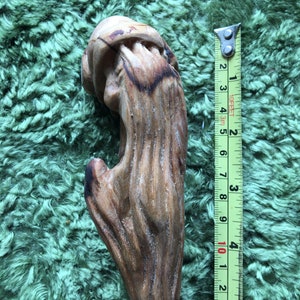Handcarved fruitwood tobacco pipe yawning man