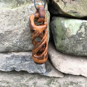 Handcarved unusual laburnum wood ball-in-spiral-cage pendant ncklace