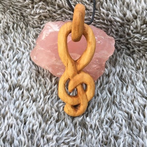 Hand carved fruitwood treble clef music symbol pendant necklace
