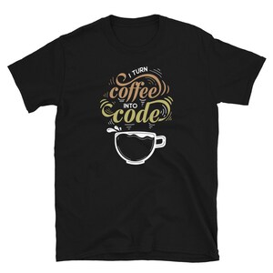 May include: Black t-shirt with a white graphic design that says "I turn coffee into code" with a stylized coffee cup illustration.
