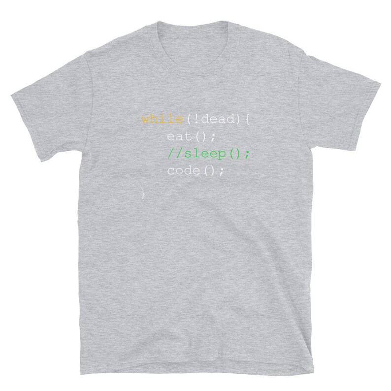 May include: A light grey t-shirt featuring a programming code snippet. The text includes "while (!dead)", "eat()", "//sleep()", and "code()" in different colours. The shirt is made of a soft material and is suitable for casual wear.