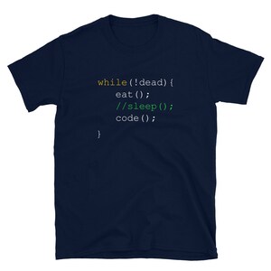 May include: A navy blue t-shirt featuring the code snippet "while (!dead) { eat(); //sleep(); code(); }" in a colourful font. This short-sleeved tee is designed for casual wear.