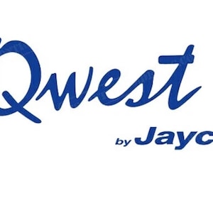 May include: The word "Qwest" in a stylized, dark blue script font, with "by Jayco" in a smaller, dark blue sans-serif font below it, all on a white background.