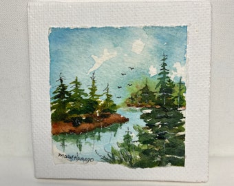 Mini watercolor on canvas with easel. Pine trees at the lake. Original painting.
