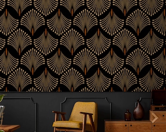 May include: Black wallpaper with a repeating Art Deco fan design in gold and brown. The room includes a mustard yellow chair, wooden furniture, and a dark wall panel.