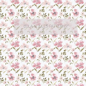 Peut inclure: Un motif sans couture composé de délicates fleurs roses et blanches en aquarelle sur un fond blanc. Les fleurs sont disposées en un motif répétitif, créant un aspect doux et romantique. Le texte "Lola & Jules Patterns" apparaît au centre de l'image.