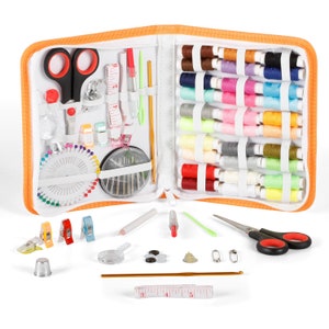 May include: An open orange zippered sewing kit with various sewing supplies. The kit includes scissors, needles, thread spools in multiple colors, measuring tape, pins, and other sewing tools. The kit is on a white background.