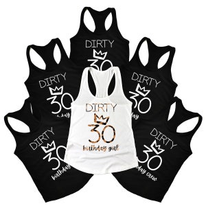 May include: Five black tank tops with white text that reads "Dirty 30" with a crown above the number. One white tank top with black text that reads "Dirty 30" with a crown above the number and the words "birthday girl" below the number. The number 30 is in a leopard print pattern.