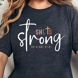 She Is Strong Proverbs 31:25 Christian Graphic Tee, She Is Strong Bible Verse Tee, Proverbs 31 25 Christian Women Tee, Women’s Faith Shirt