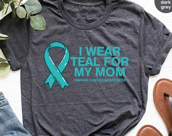 Camiseta para supervivientes de cáncer de ovario, regalo para personas con cáncer, camisetas con estampados sobre cáncer de ovario, camiseta de concienciación sobre el cáncer de ovario, camisetas con cuello en V y lazo turquesa contra el cáncer.