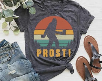 Funny Forest Creature Beer Shirt, Big Cryptid Drinking Shirt, Funny Cryptozoology Gift, Camping Hiking Shirt, Retro Sunset Outdoors Tee