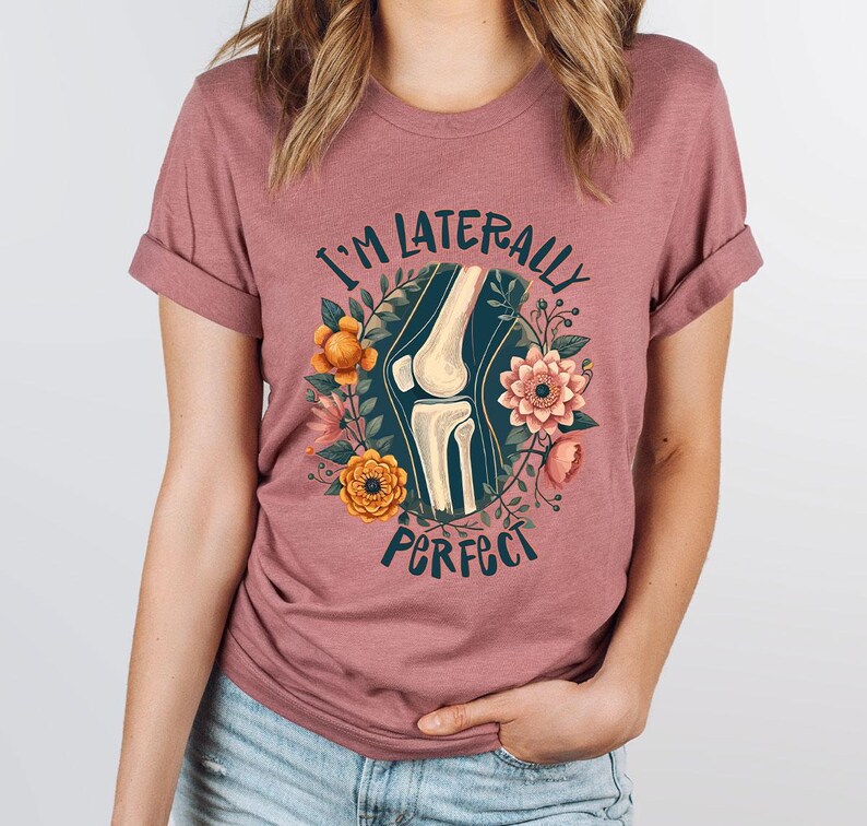 a woman wearing a t - shirt that says i'm literally perfect