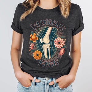 a woman wearing a black t - shirt that says i'm latebran