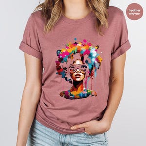a woman wearing a t - shirt with a picture of a woman's face