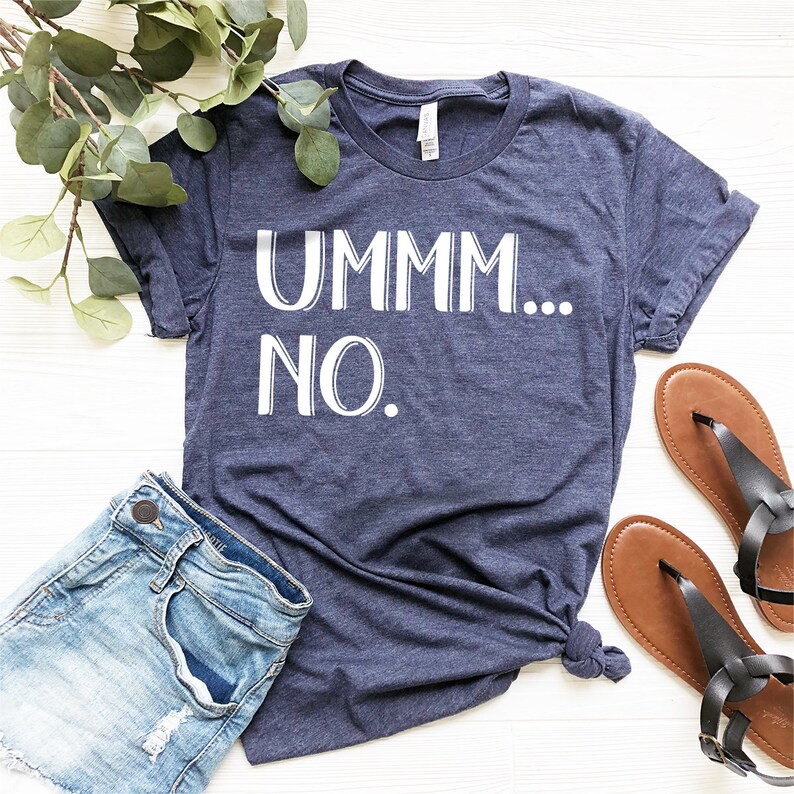 May include: A navy blue t-shirt with white text that reads "UMMM... NO."