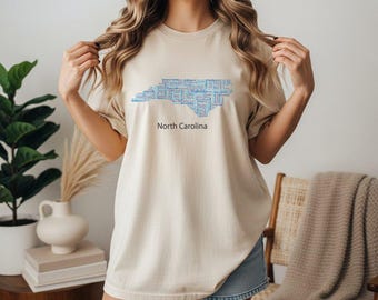 Comfort Colors®North Carolina Typographic Map Shirt, State Pride Apparel for Regional Celebration, Home State Graphic Unisex Tank Top