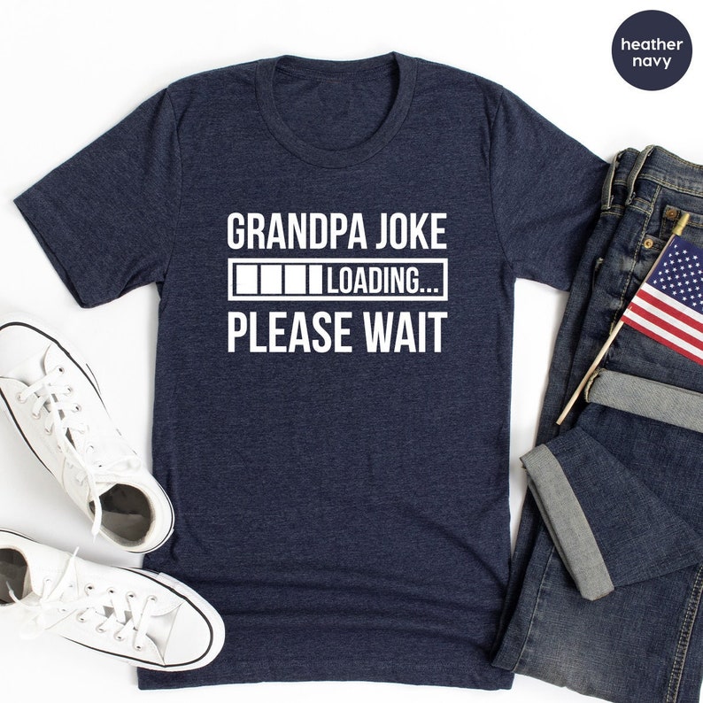 May include: A heather navy blue t-shirt with the text "Grandpa Joke" and a progress bar that says "LOADING... PLEASE WAIT".