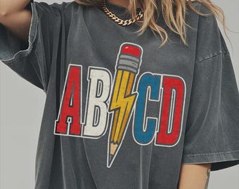 Comfort Colors® Colorful Alphabet Teacher Shirt, Funny Back To School Shirt, Teacher Appreciation Gift, ABCD Pencil Lightning