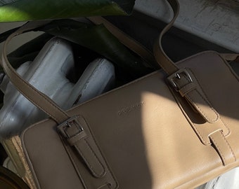 koltov purse with coin organizer Cinosural International School