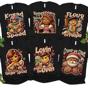 May include: Six black t-shirts with gingerbread people designs. The shirts feature phrases like "Kneed for Speed", "Boss of the Batch", "Flour to the People", "Lovin' from the Oven", "Crumb-pa Claus", and "Ginger Spiced".