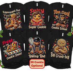 May include: Six black t-shirts with different gingerbread cookie designs and funny sayings. The sayings include "Eggnogged Out", "Spicy Sugar Cookie", "Too Cool For Cookie School", "Freak On The Cookie Sheet", "Baking Bad", and "Bah Crumb-bug".
