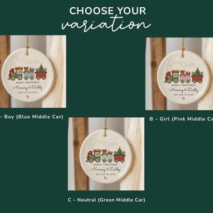 May include: Christmas ornament with a train design. The ornament has the text "Merry Christmas Mommy & Daddy" and "See you in 2024". The train cars are decorated with festive elements.