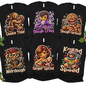 May include: Six black t-shirts with gingerbread men designs and funny sayings. The shirts feature designs like "Cookie Thief", "Let's Dough Crazy", "Dough-tarious", "Weirdough", "Ginger Spiced", and "Kneed for Speed".
