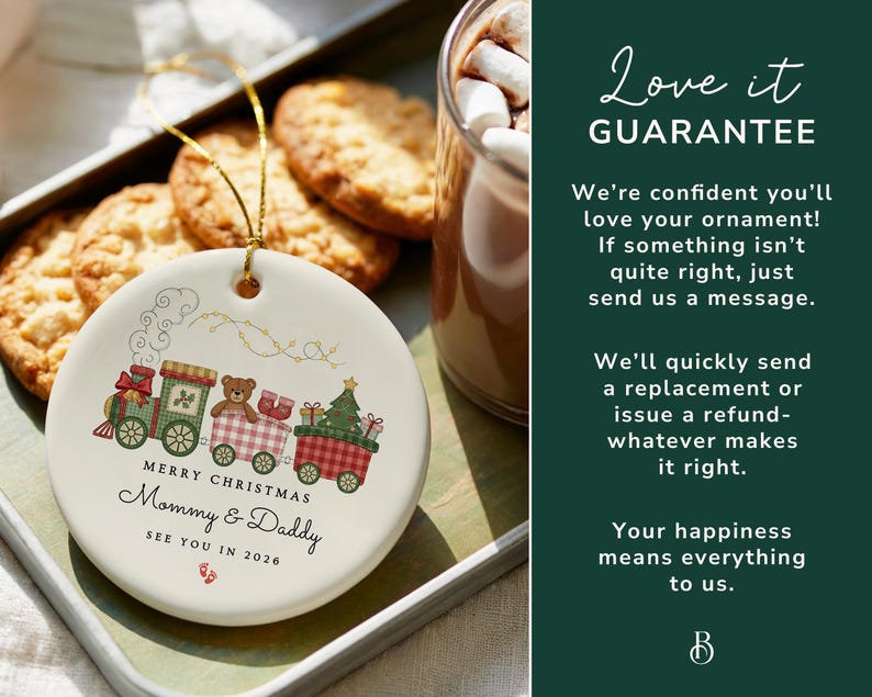 May include: A white ceramic Christmas ornament with a train design. The train cars feature a Christmas tree, a teddy bear, and gifts. The text reads "Merry Christmas Mommy & Daddy See You in 2026". A gold string is attached for hanging.